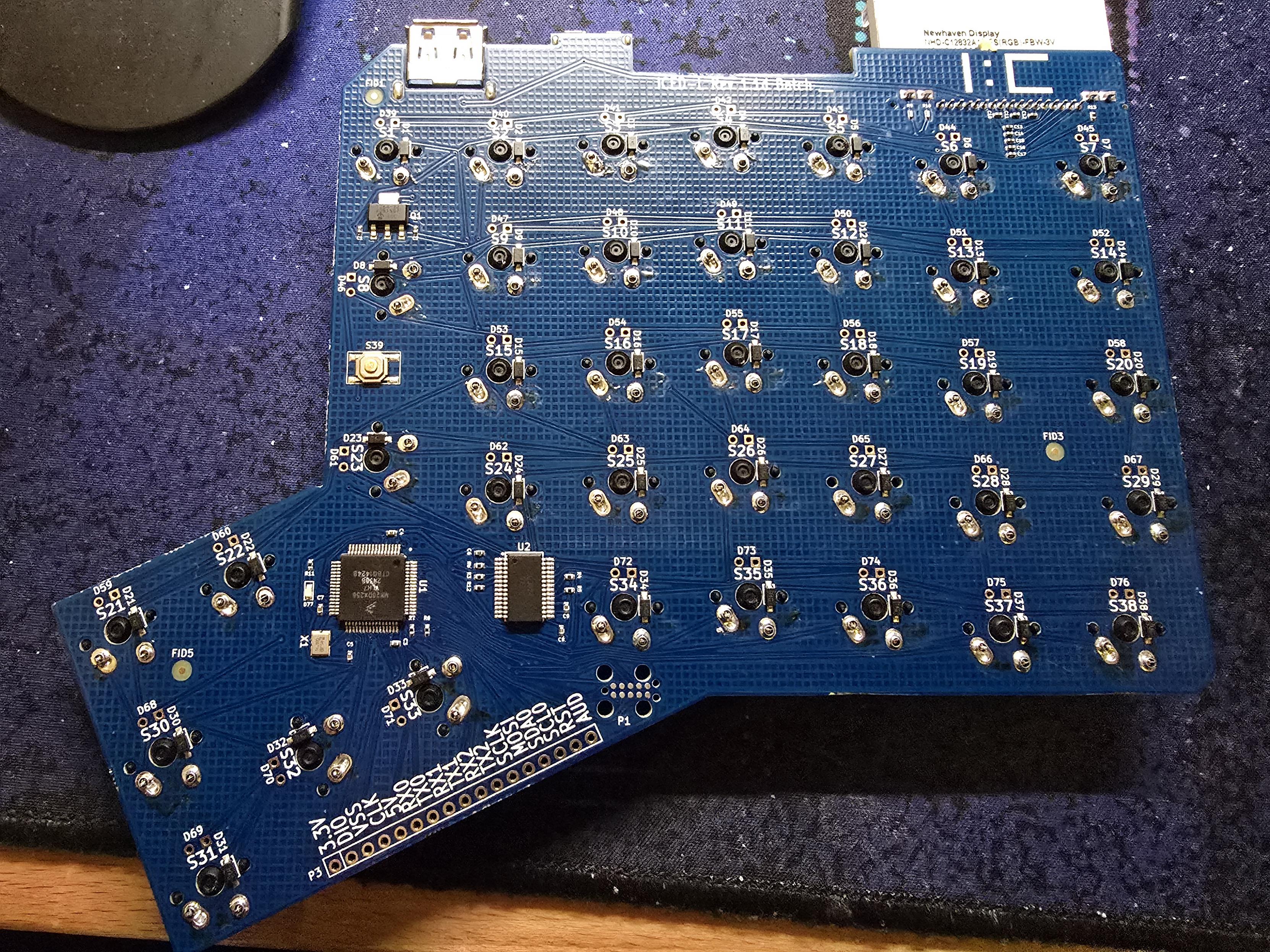 The bottom side of the circuit board, with solder joints visible.